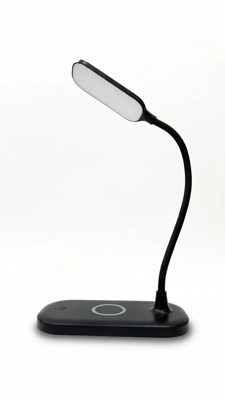 Modern LED Desk Lamp with Wireless Charging Pad This is a sleek, modern desk lamp featuring an adjustable LED light arm and an integrated wireless charging pad for smartphones.